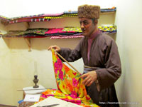 A fabric salesman (wax)
